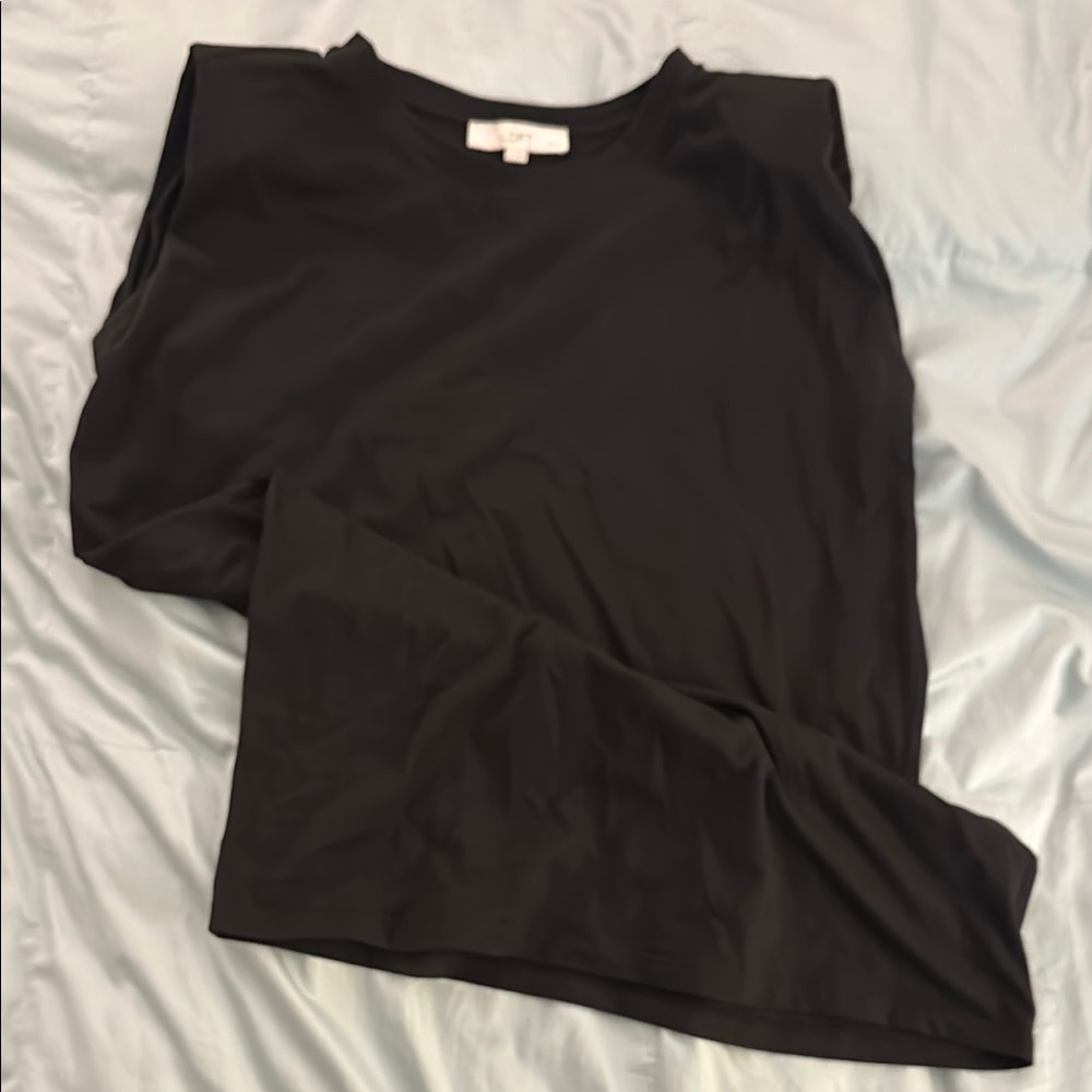 Black t-shirt dress with shoulder pads
